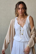 Top tipo raso con volantes blanca