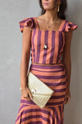Bolso fiesta tipo rafia dorado y concha