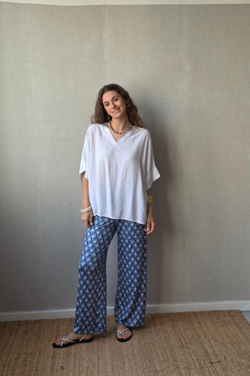 Pantalón estampado fuego con bolsillos azul jeans