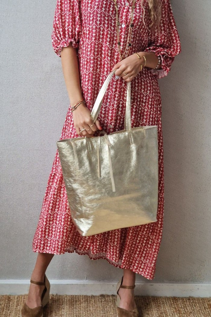 Bolso de piel dorado con opción de personalizar