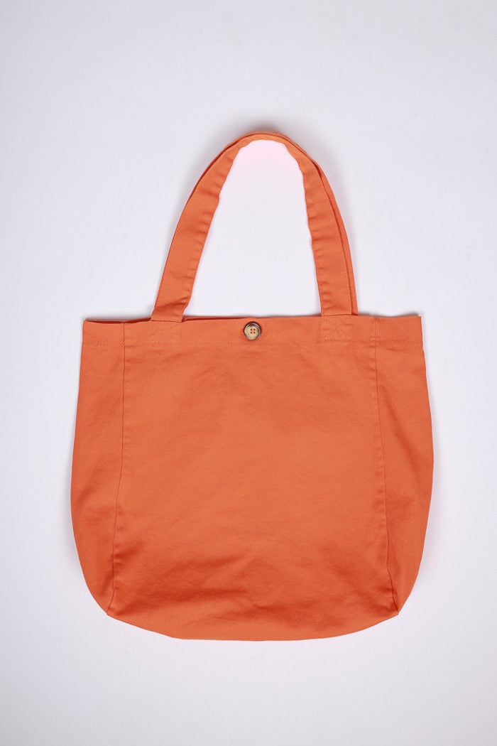 Bolso de loneta naranja con opción de personalizarlo
