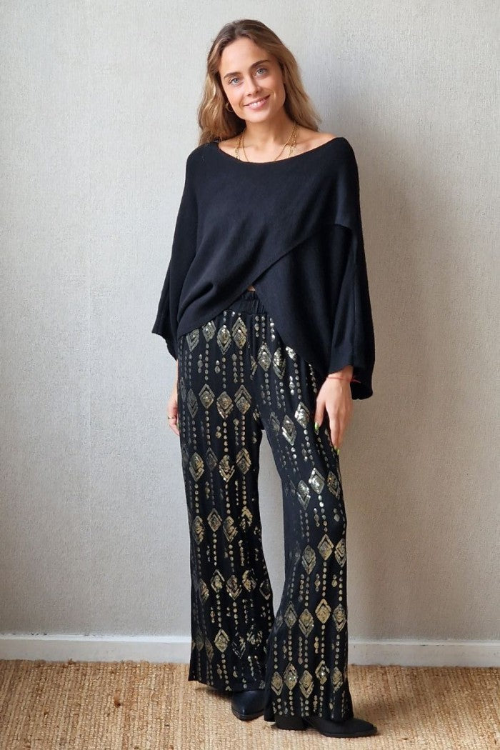 Pantalón de punto negro con lentejuelas