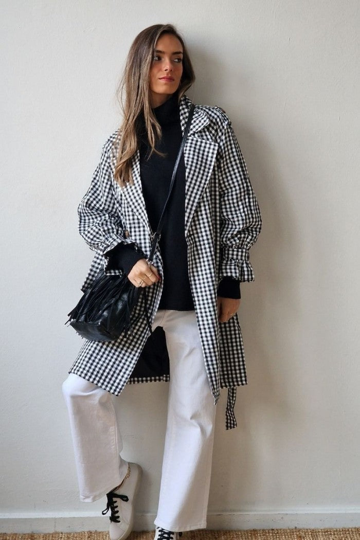Bolso de piel liso con flecos negro