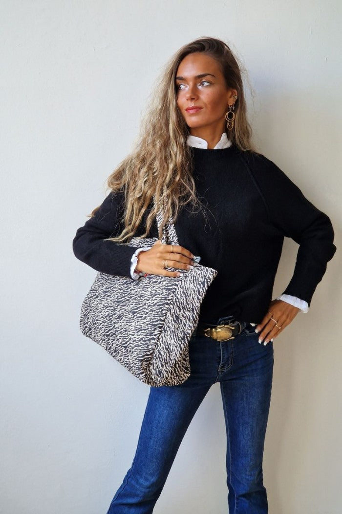 Bolso de tela acolchado con estampado animal print