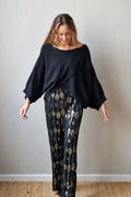 Pantalón de punto negro con lentejuelas