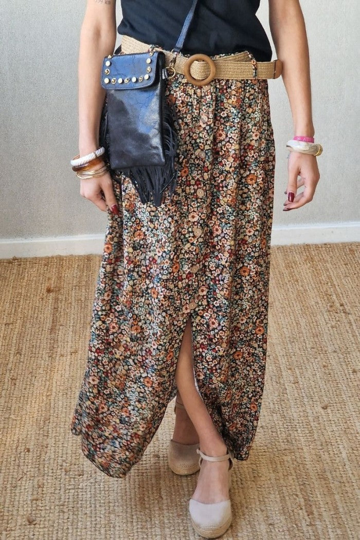 Bolso mini de piel con flecos y tachas negro