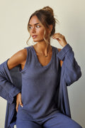 Top punto color azul con rayas doradas