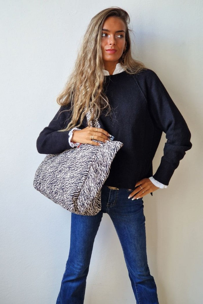 Bolso de tela acolchado con estampado animal print