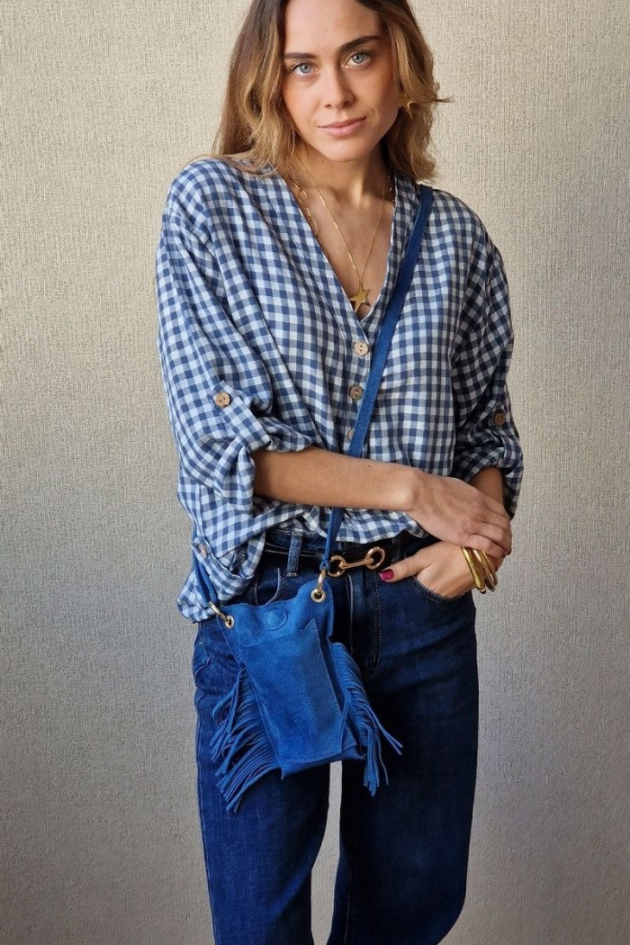 Bolso mini de ante y flecos azul