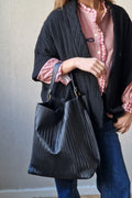 Bolso de piel trenzada negro