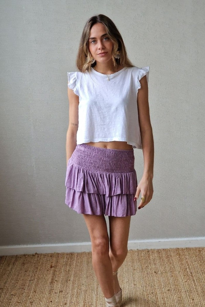 Minifalda pantalón lila con lurex cintura de goma y volantes