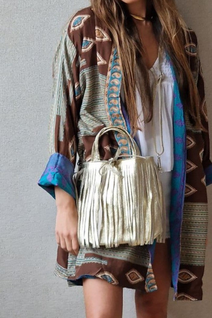 Bolso de piel liso con flecos dorado