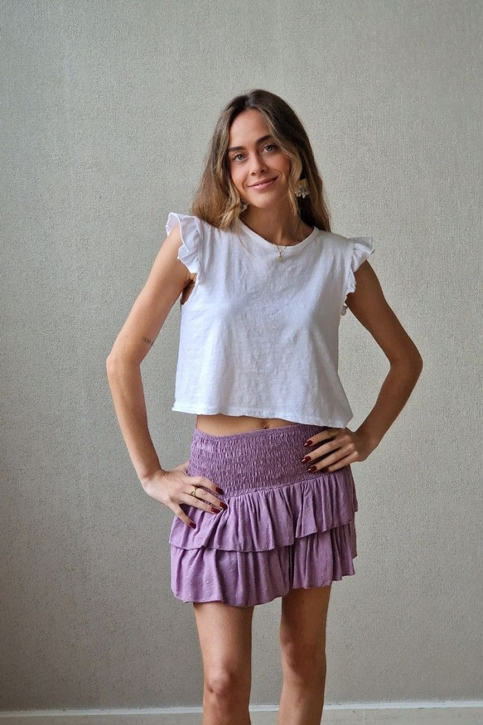 Minifalda pantalón lila con lurex cintura de goma y volantes