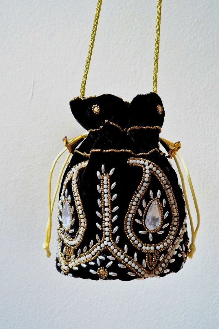 Bolso bombonera negro y dorada